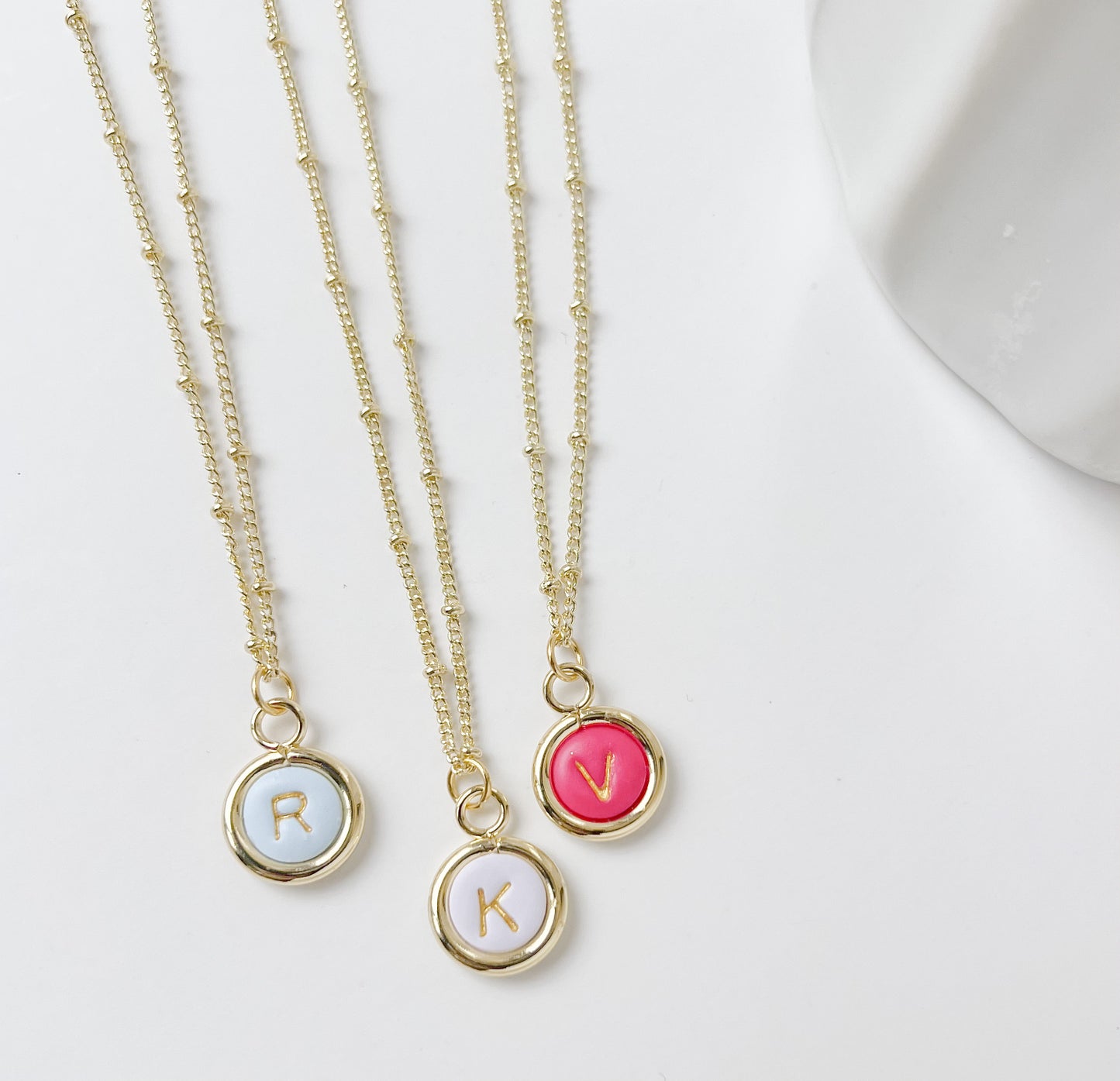 Initial necklaces